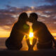 A close-up of a couple kissing, highlighting the risks of diseases transmitted through saliva.